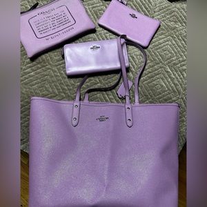 Coach lavender  tote with wristlet, wallet and pouch.